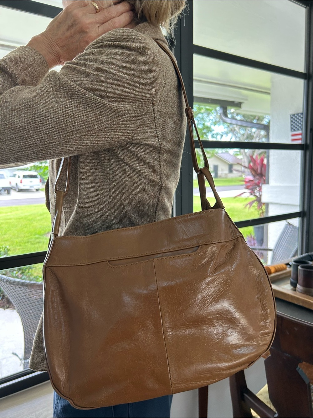 Vintage Hobo International Tan Leather Shoulder Bag with Curved Silhouette